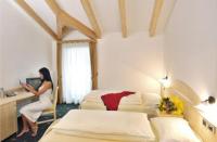 Posteľ alebo postele v izbe v ubytovaní Hotel Fior Di Bosco