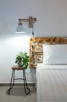 Posteľ alebo postele v izbe v ubytovaní Amperian Mykonos Suites & Villas