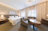 Posteľ alebo postele v izbe v ubytovaní Hotel Jakubus