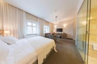 Posteľ alebo postele v izbe v ubytovaní Hotel Jakubus