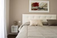 Posteľ alebo postele v izbe v ubytovaní Home Suites Home