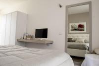 Posteľ alebo postele v izbe v ubytovaní Home Suites Home