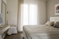 Posteľ alebo postele v izbe v ubytovaní Home Suites Home