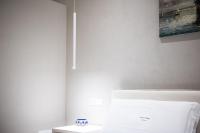 Posteľ alebo postele v izbe v ubytovaní Atto Primo Studio Apartment
