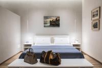 Posteľ alebo postele v izbe v ubytovaní Atto Primo Studio Apartment