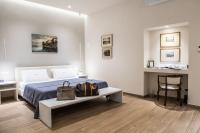 Posteľ alebo postele v izbe v ubytovaní Atto Primo Studio Apartment