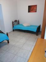 Postel nebo postele na pokoji v ubytování Alekas Pool and Garden Home