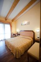 Posteľ alebo postele v izbe v ubytovaní Hotel Regio