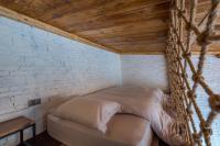 Łóżko lub łóżka w pokoju w obiekcie Autumn Inn