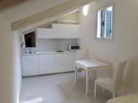 Kuchyňa alebo kuchynka v ubytovaní Casanova Apartment San Marco