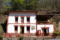 a small house on the side of a hill at Casa Rural Priena in Covadonga