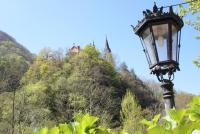 a street light in front of a mountain at Casa Rural Priena in Covadonga