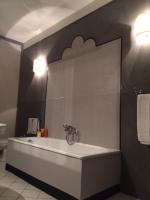 A bathroom at Capri Moon Guest House