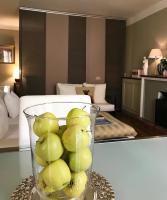 A bed or beds in a room at Capri Moon Guest House