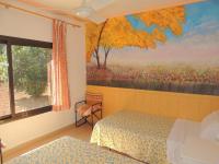 Postel nebo postele na pokoji v ubytování Villa Bosque