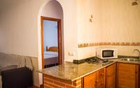 Kuchyňa alebo kuchynka v ubytovaní Apartamentos Bellavista Bolonia