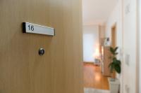 a door with the number on it in a room at Apartman SUN in Inđija
