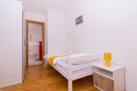 Postel nebo postele na pokoji v ubytování APARTMENT ABA