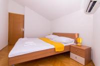 Postel nebo postele na pokoji v ubytování APARTMENT ABA
