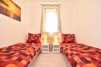 Postel nebo postele na pokoji v ubytování Bretia Apartments