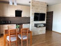 Kuchyň nebo kuchyňský kout v ubytování Apartament Jaśminowy Shiraz Gdynia