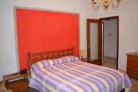 A bed or beds in a room at Villa Paulette