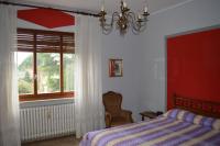 A bed or beds in a room at Villa Paulette