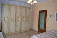 A bed or beds in a room at Villa Paulette
