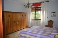A bed or beds in a room at Villa Paulette