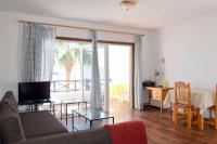 TV a/nebo společenská místnost v ubytování Apartamento Reni