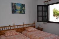 Postel nebo postele na pokoji v ubytování Apartamento Reni