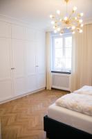 Posteľ alebo postele v izbe v ubytovaní Rycerska - Stone Steps Apartments