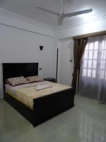 A bed or beds in a room at Nile Sunrise Flats