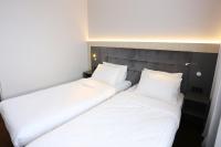 Posteľ alebo postele v izbe v ubytovaní euroHOTEL Sosnowiec Kazimierz