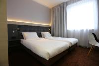 Posteľ alebo postele v izbe v ubytovaní euroHOTEL Sosnowiec Kazimierz