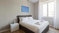 A bed or beds in a room at Italianway - Largo Allegri 4