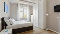A bed or beds in a room at Italianway - Largo Allegri 4