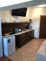 Kuchyňa alebo kuchynka v ubytovaní Regina Delux Apartman