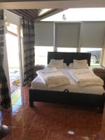Posteľ alebo postele v izbe v ubytovaní Regina Delux Apartman