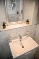 Kúpeľňa v ubytovaní Rába Apartman House