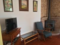 TV a/nebo společenská místnost v ubytování Rural El Puerto Mayordomo