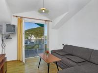 Televízia a/alebo spoločenská miestnosť v ubytovaní Apartment Rubin-9 by Interhome