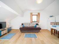 Televízia a/alebo spoločenská miestnosť v ubytovaní Holiday Home Oltari by Interhome
