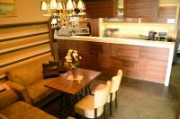 Kuchyň nebo kuchyňský kout v ubytování Hotel Leonardo