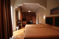 Posteľ alebo postele v izbe v ubytovaní Adams Hotel