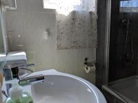 Kúpeľňa v ubytovaní Abdalla Apartments