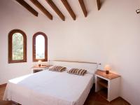 A bed or beds in a room at Holiday Home Luz y Paz by Interhome