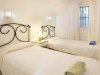 Postel nebo postele na pokoji v ubytování Villa Villa Pueblo Jara by Interhome