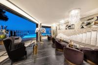 Posedenie v ubytovaní Posh Residence Luxury Suites
