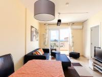 TV a/nebo společenská místnost v ubytování Apartment La Marina by Interhome
